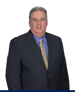 Corporate headshot of comptroller Roberto Diaz
