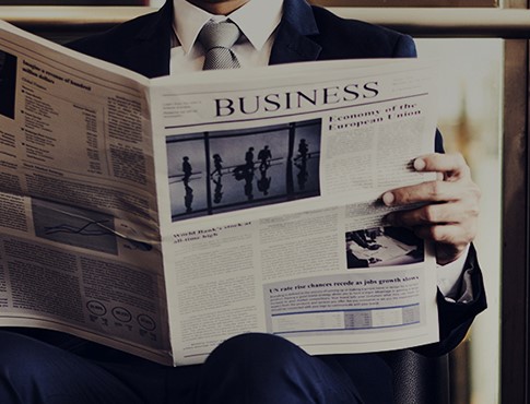 man holding newspaper