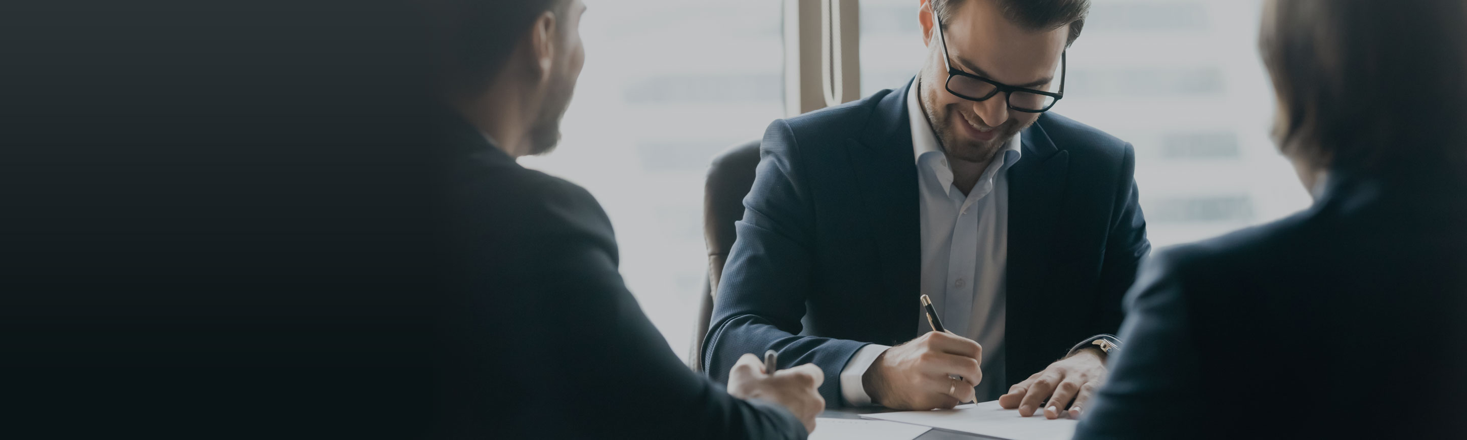 Business professional man signing documents