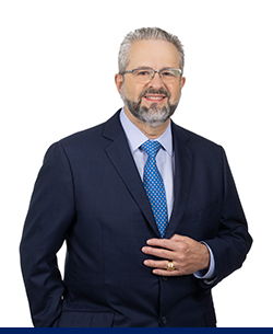 Corporate headshot of Chief Credit Officer Benigno Pazos