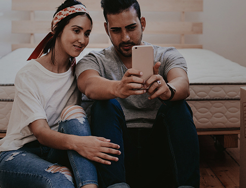 young couple taking selfie